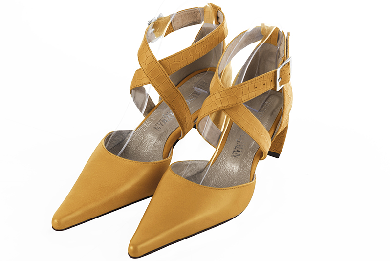 Mustard yellow women's open side shoes, with crossed straps. Pointed toe. Medium comma heels. Front view - Florence KOOIJMAN